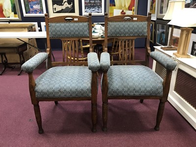 Lot 592 - A PAIR OF ARTS & CRAFTS OAK OPEN ELBOW CHAIRS