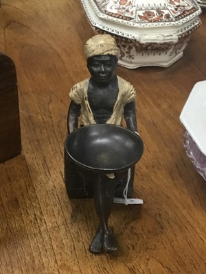 Lot 599 - A BRONZE FIGURE OF A SEATED FIGURE