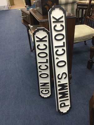 Lot 605 - GIN O'CLOCK, A PAINTED WOOD STREET SIGN STYLE PLAQUE AND A PIMM'S O'CLOCK SIGN