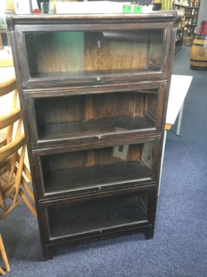 Lot 614 - AN OAK SECTIONAL BOOKCASE