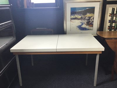 Lot 619 - A MODERNIST EXTENDING DINING TABLE