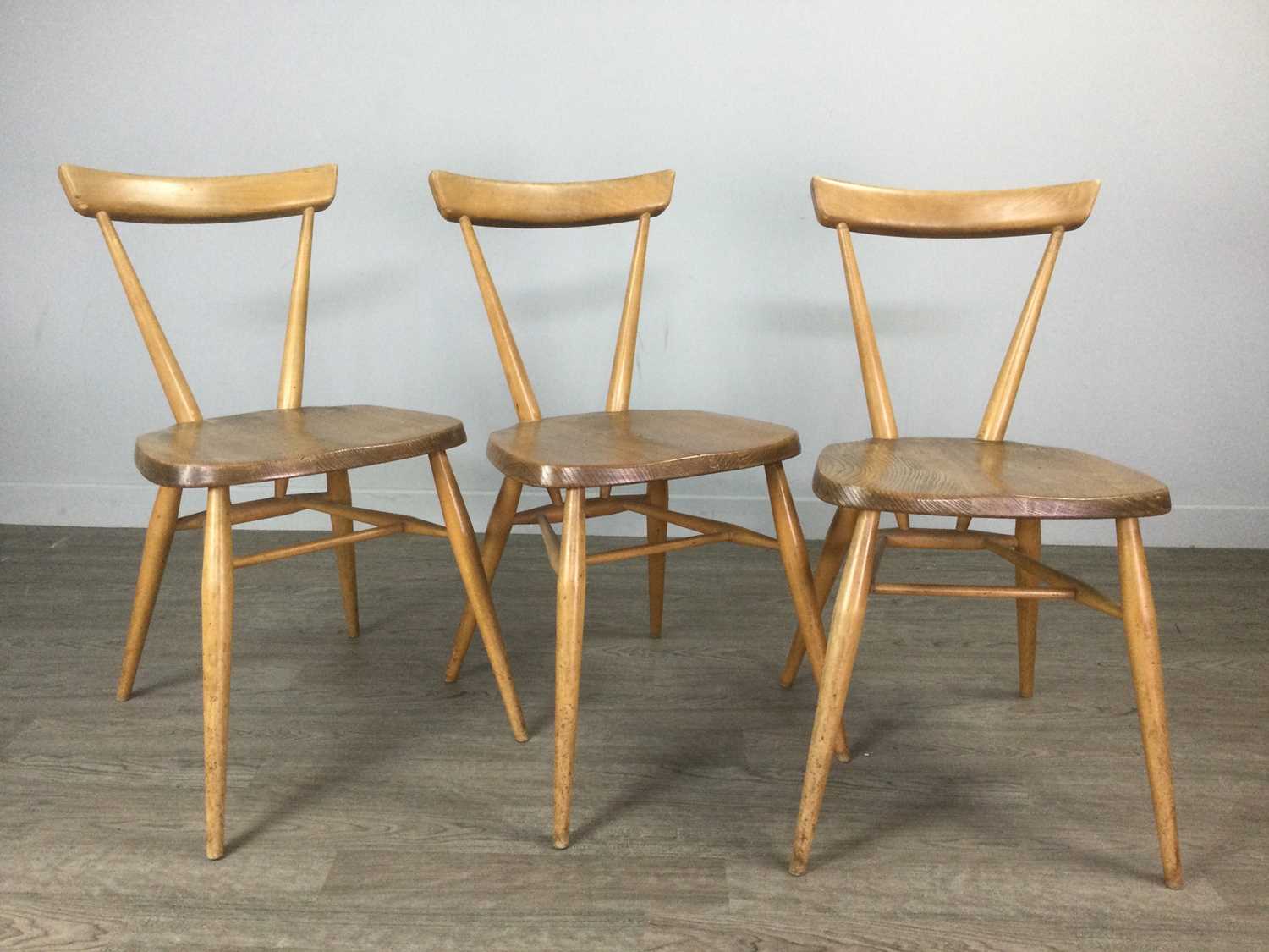 Lot 1390 - A SET OF ERCOL SIX BLOND BEECH AND ELM SINGLE CHAIRS
