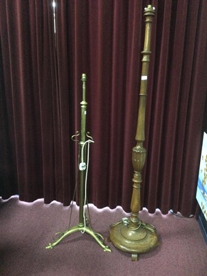 Lot 644 - A MAHOGANY STANDARD LAMP AND A BRASS FLOOR LAMP