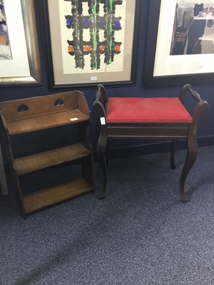 Lot 632 - AN EARLY 20TH CENTURY PIANO STOOL AND A OAK OPEN BOOKSHELF