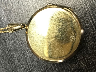 Lot 833 - TWO GOLD CHAINS AND A LOCKET