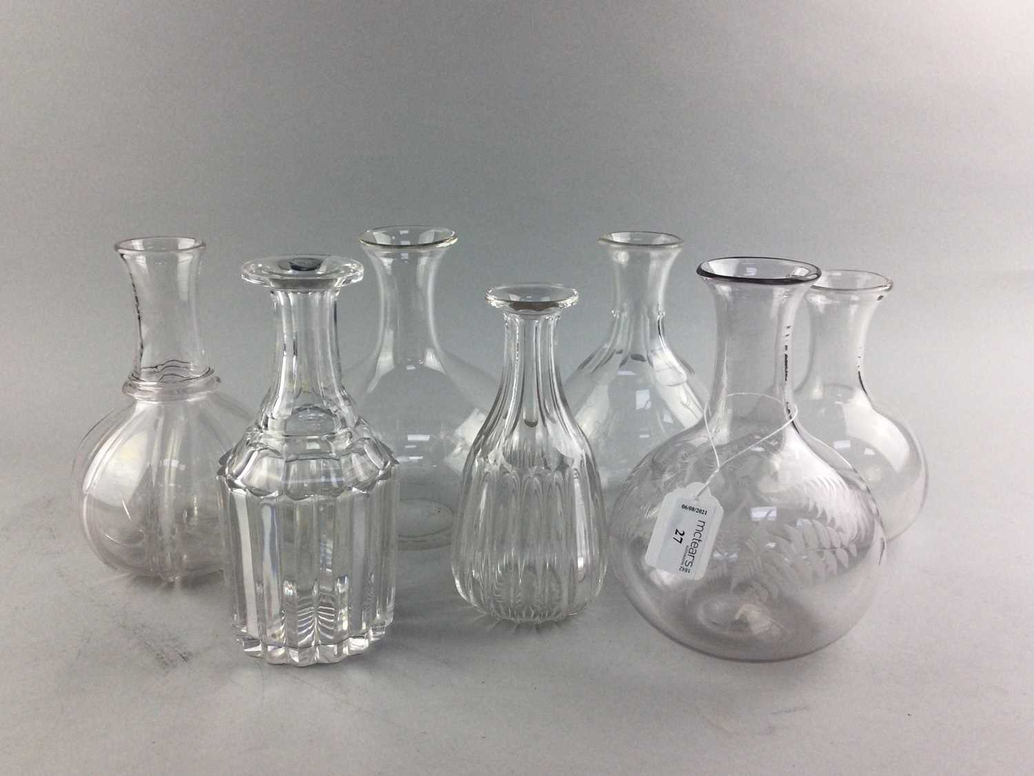 Lot 27 - A COLLECTION OF SEVEN VICTORIAN AND LATER GLASS CARAFES