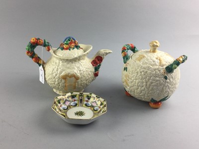 Lot 28 - A CLARICE CLIFF AUTUMN HARVEST PATTERN TEAPOT AND SUGAR BOWL