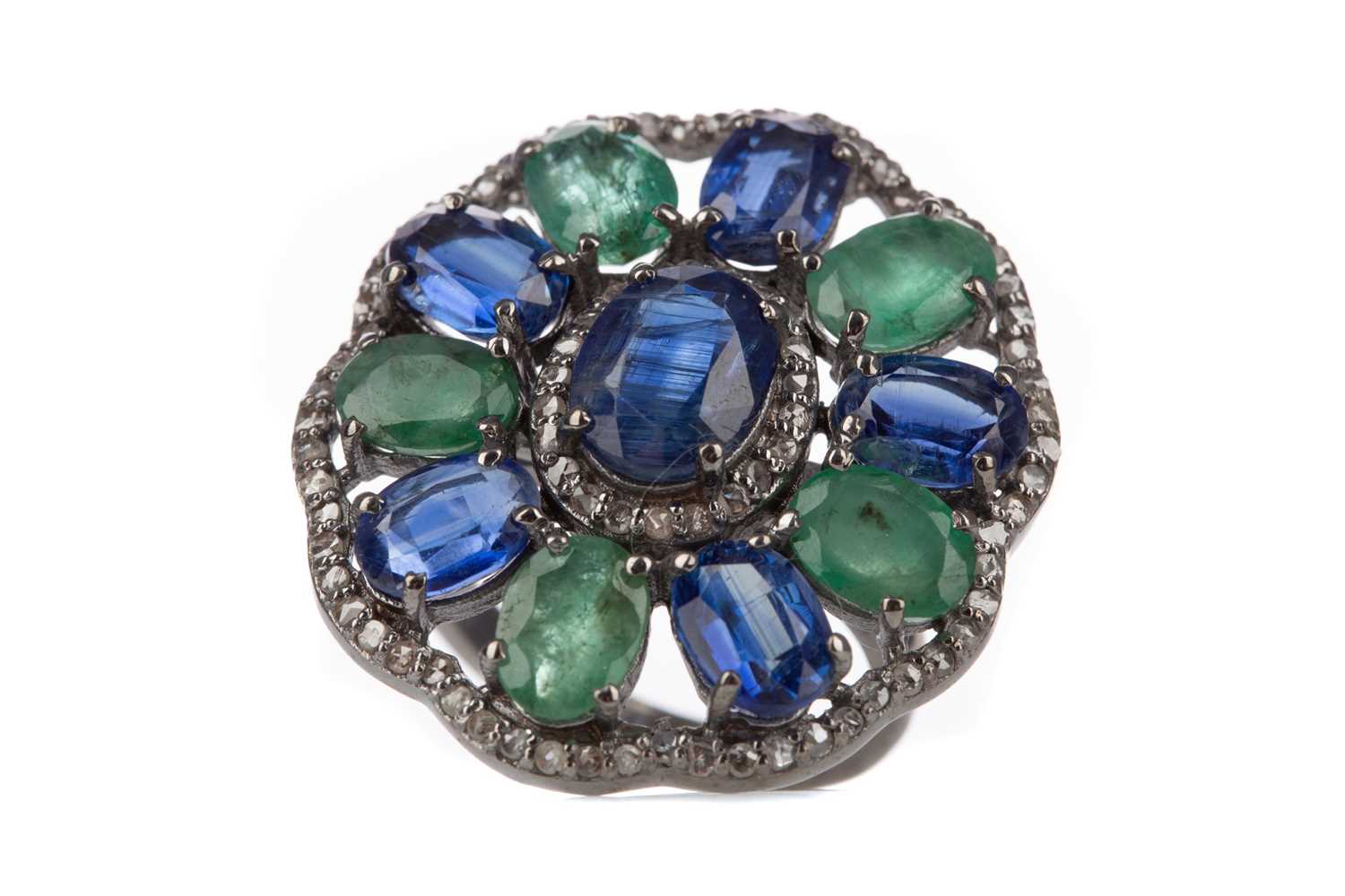 Lot 1503 - A KYANITE, EMERALD AND DIAMOND RING