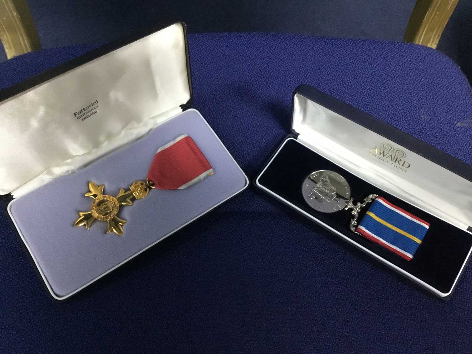 Lot 48 - AN OBE MEDAL IN ORIGINAL CASE AND ANOTHER MEDAL