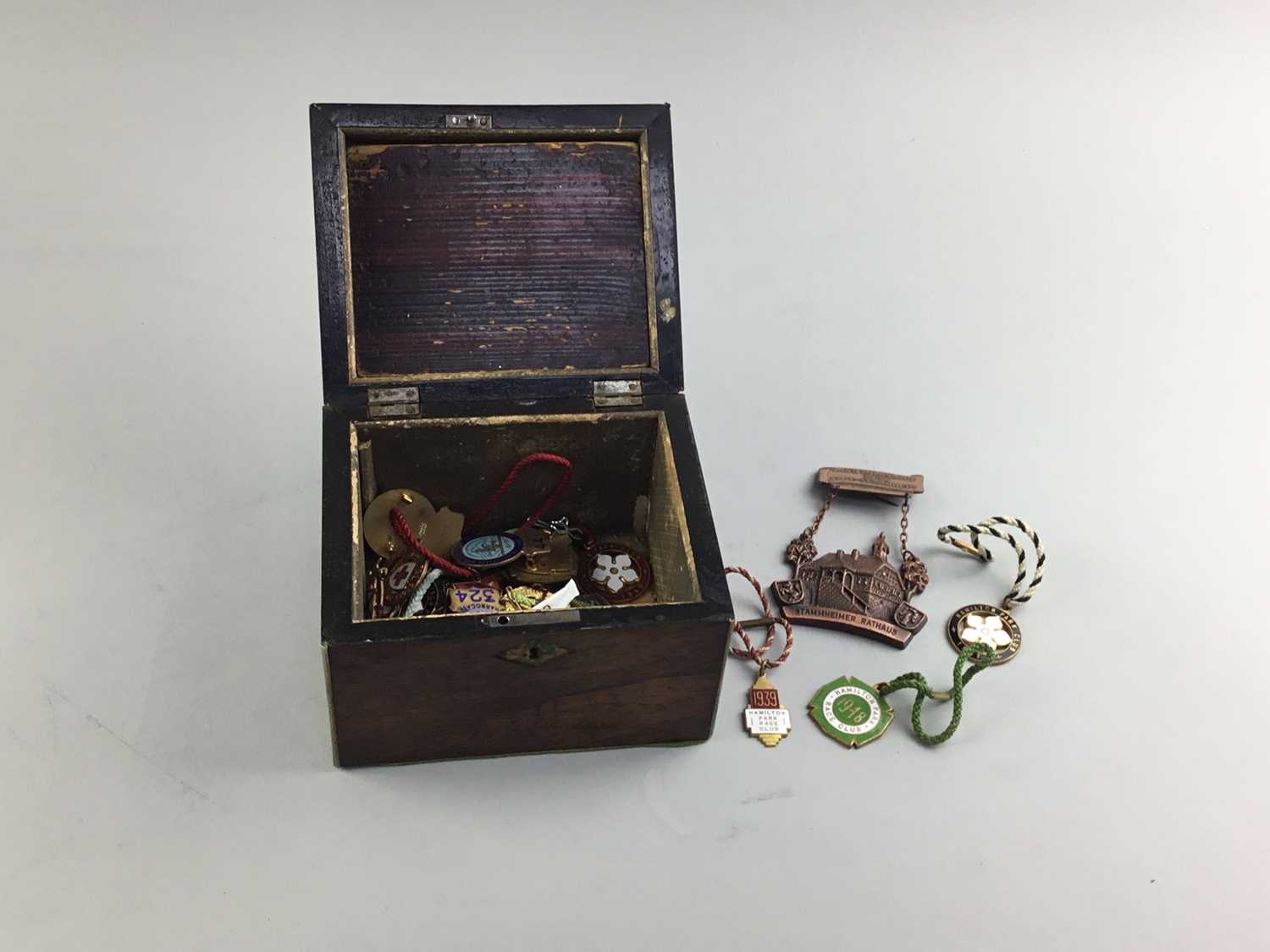 Lot 69 - A LATE 19TH CENTURY ROSEWOOD TEA CADDY AND ENAMEL BADGES
