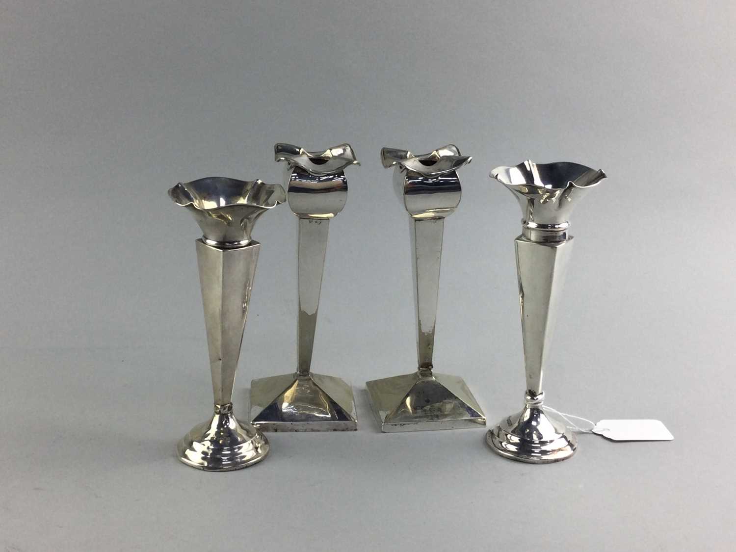 Lot 76 - A PAIR OF SILVER SOLIFLEUR VASES AND A PAIR OF CANDLESTICKS