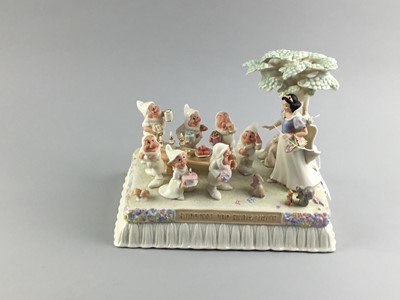 Lot 140 - A LENOX DISNEY SHOWCASE FIGURE GROUP OF 'AT THE PARADE WITH SNOW WHITE'