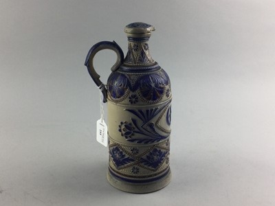 Lot 255 - A GERMAN STONEWARE FLAGON