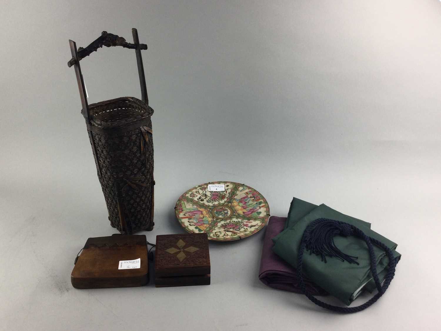 Lot 4 - A CHINESE FAMILLE ROSE CIRCULAR CHARGER, WOOD ITEMS AND TEXTILES