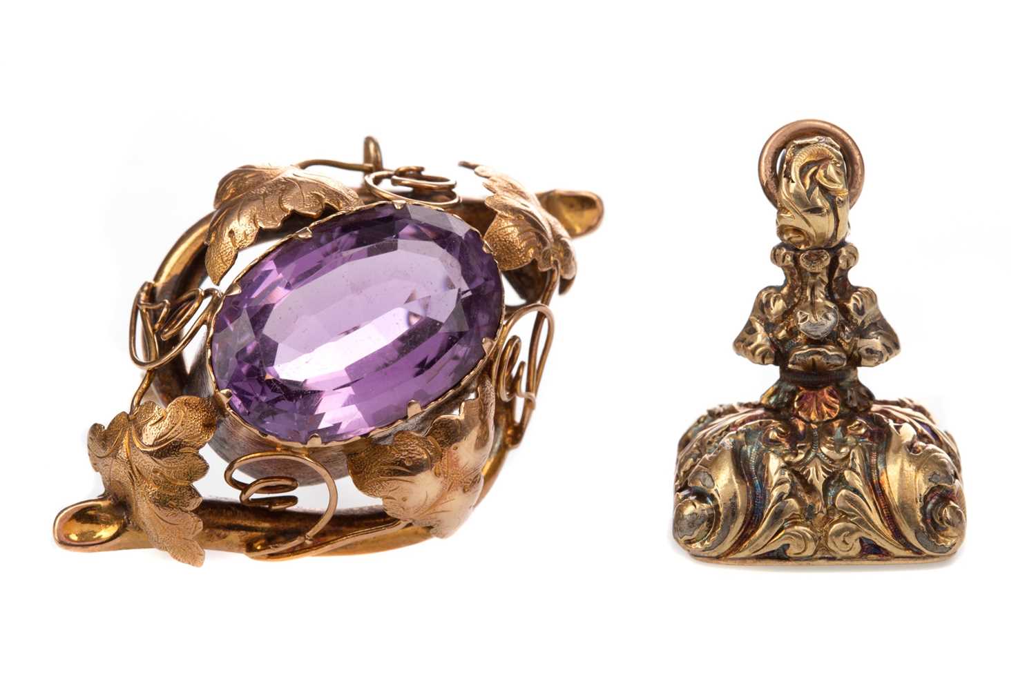 Lot 307 - AN AMETHYST BROOCH, PLATED FOB AND PAIR OF EARRINGS