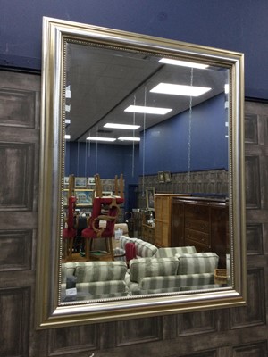Lot 275 - A LARGE MODERN WALL MIRROR IN A SILVERED FRAMED