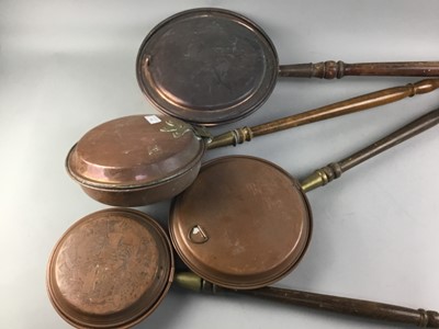 Lot 303 - A GROUP OF FOUR COPPER BED WARMING PANS