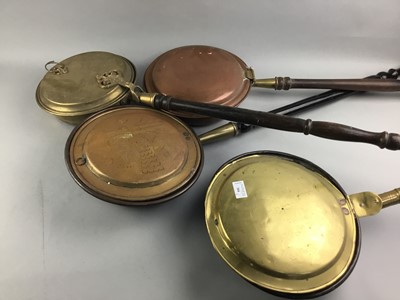 Lot 304 - A LOT OF THREE BRASS BED WARMING PANS