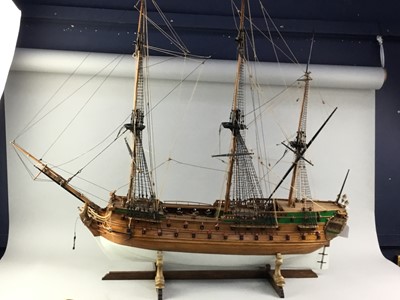 Lot 308 - A WOODEN MODEL OF A THREE MASTED MAN O' WAR