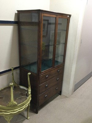 Lot 232 - AN OAK DISPLAY CABINET