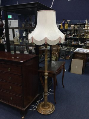 Lot 243 - A STAINED WOOD STANDARD LAMP