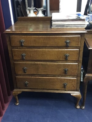 Lot 242 - AN OAK FOUR DRAWER CHEST AND A MATCHING CHEST