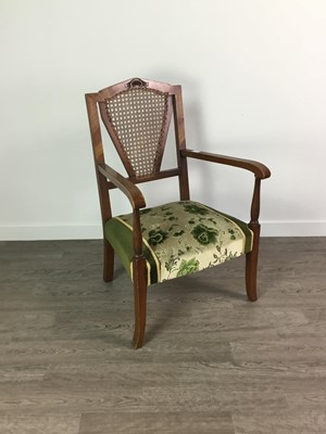 Lot 335 - A WALNUT CANE BACK ARM CHAIR