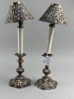 Lot 353 - A PAIR OF SILVER PLATED CANDLESTICKS