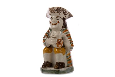 Lot 1047 - AN EARLY 19TH CENTURY TOBY JUG