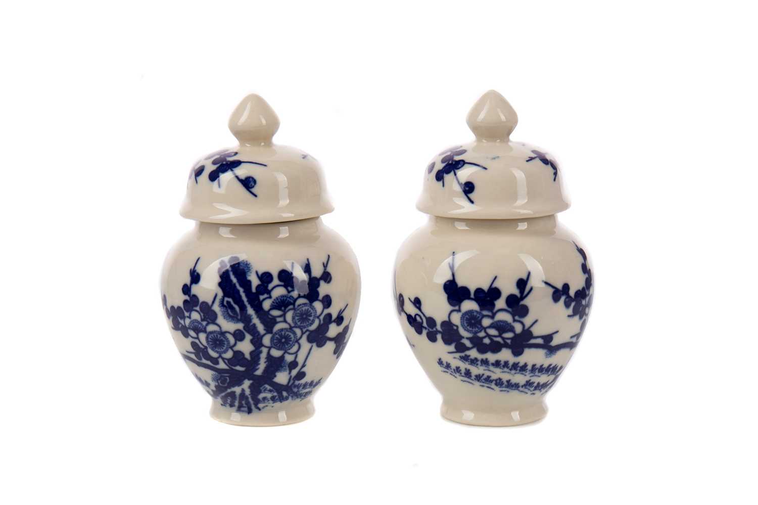 Lot 1775 - A PAIR OF 20TH CENTURY CHINESE BLUE AND WHITE VASES WITH COVERS