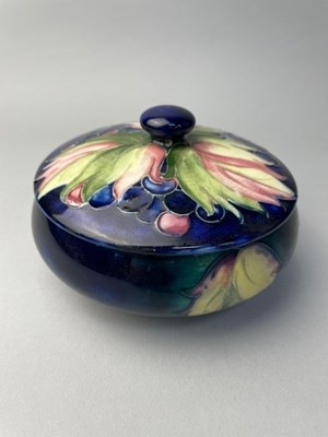 Lot 11 - A MOORCROFT JAR WITH COVER