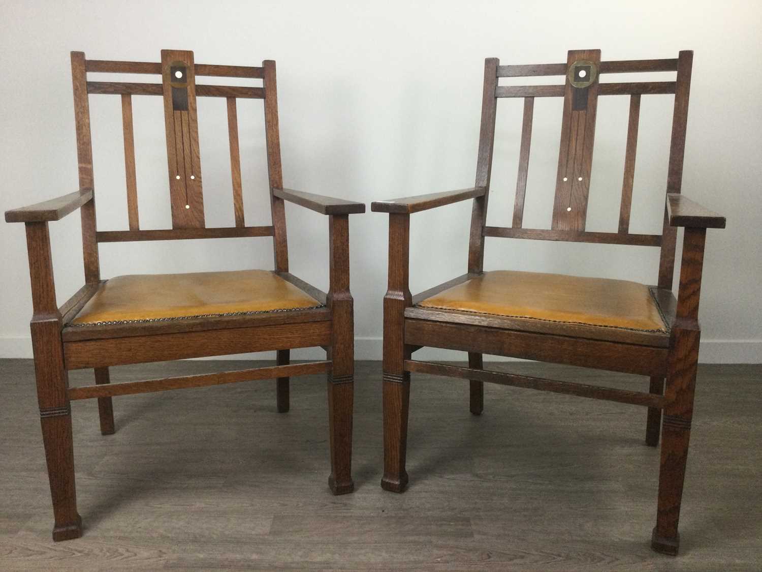 Lot 1366 - A PAIR OF ARTS & CRAFTS OAK ARMCHAIRS