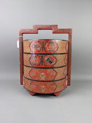 Lot 1751 - A CHINESE LACQUERED CYLINDRICAL PICNIC BOX
