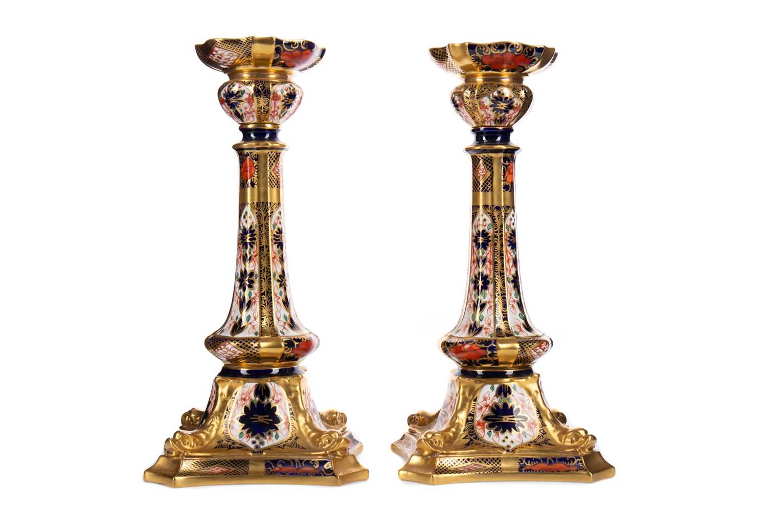 Lot 1100 - A PAIR OF ROYAL CROWN DERBY TABLE CANDLESTICKS
