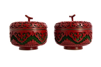 Lot 1757 - A PAIR OF 20TH CENTURY CHINESE CINNABAR LACQUER LIDDED JARS AND TWO DESK WEIGHTS