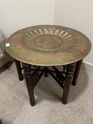 Lot 102 - AN INDIAN FOLDING OCCASIONAL TABLE