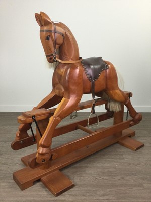 Lot 713 - A PINE CHILD'S ROCKING HORSE
