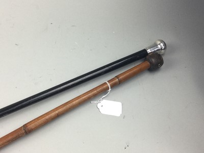 Lot 255 - A MILITARY RIDING CROP, ALONG WITH CANE