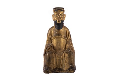Lot 1782 - A LATE 19TH CENTURY GILT GESSO AND WOOD FIGURE OF A SEATED DEITY