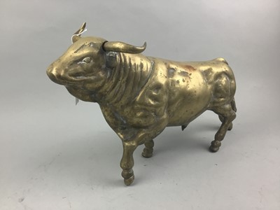 Lot 280 - A BRASS FIGURE OF A BULL ALONG WITH A PAIR OF ELEPHANT HEAD AND TRUNK BRACKETS
