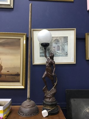 Lot 379 - A MID 20TH CENTURY BRONZED LAMP AND A COPPER PONCH POSSER