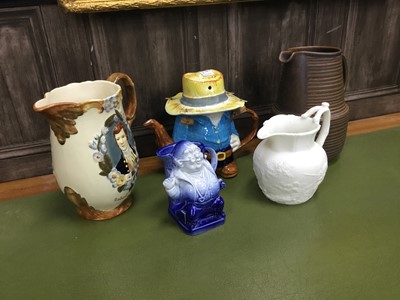 Lot 463 - A COLLECTION OF TEN JUGS AND TEAPOTS