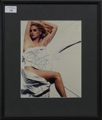 Lot 748 - A PHOTOGRAPH OF SHARON STONE