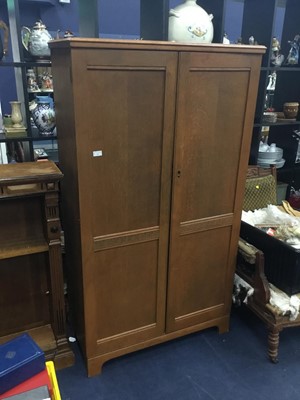 Lot 304 - AN OAK GENTS WARDROBE