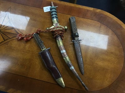 Lot 511 - A PERSIAN DAGGER AND TWO OTHER DAGGERS