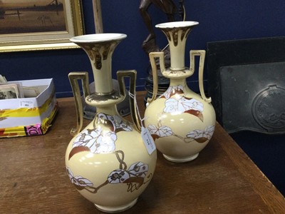 Lot 518 - A PAIR OF CHINESE TWIN HANDLED VASES