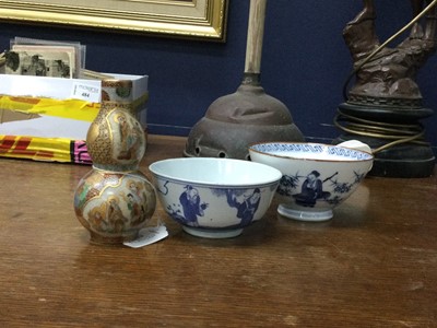 Lot 520 - A JAPANESE SATSUMA VASE AND TWO BLUE AND WHITE BOWLS