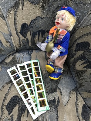 Lot 536 - A CHILD'S CLOWN TOY, THREE CHAD VALLEY PROJECTOR SLIDES AND MAGAZINES