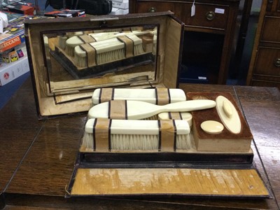 Lot 543 - AN IVORY BACKED DRESSING TABLE SET