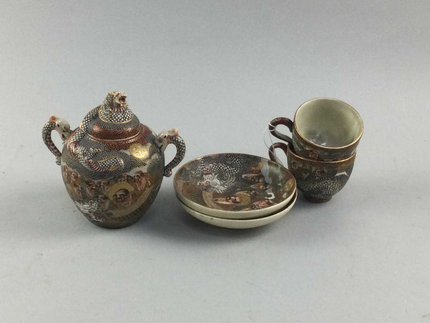 Lot 13 - A PAIR OF JAPANESE SATSUMA CUPS AND SAUCERS